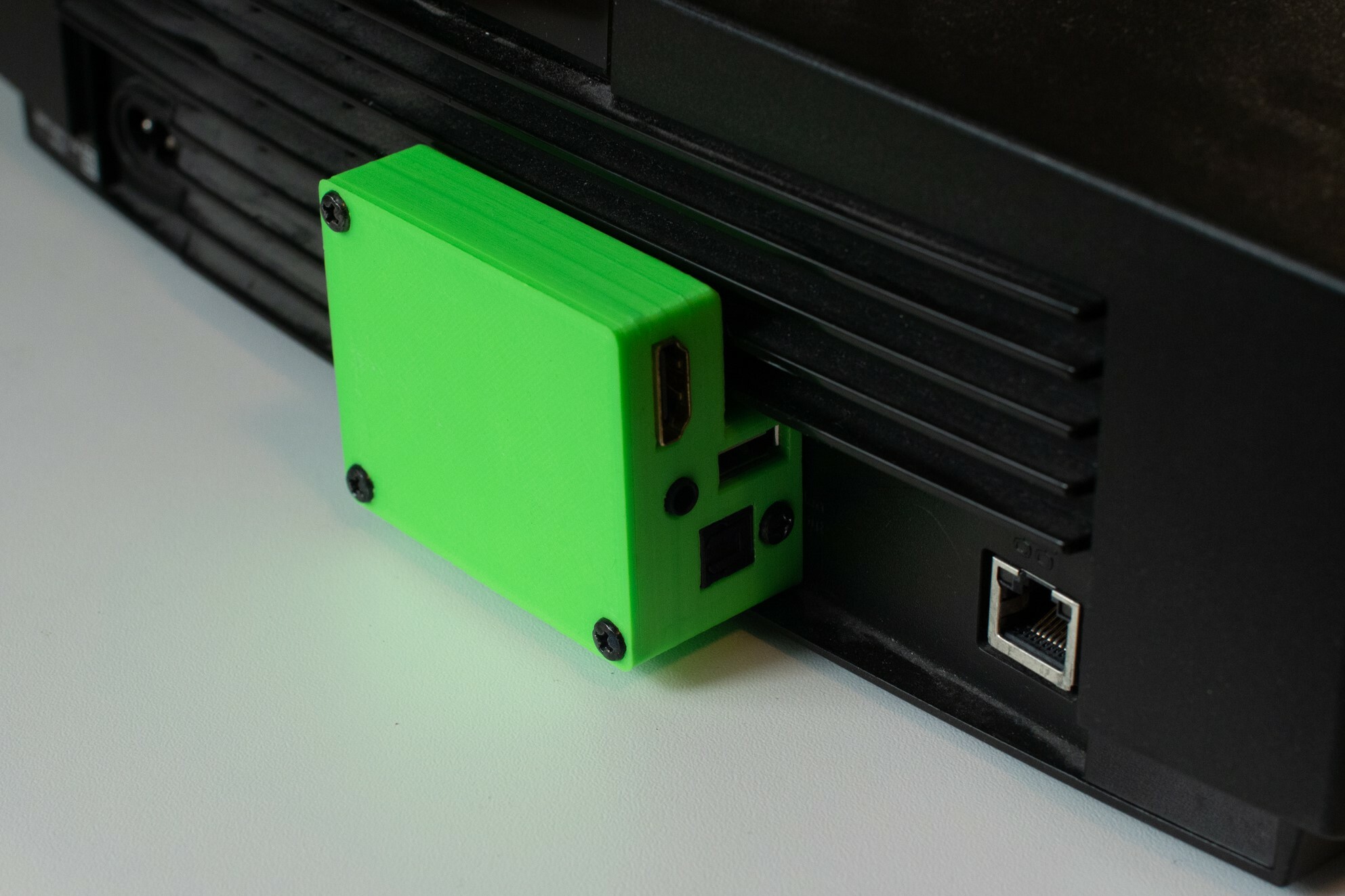 Fig 11: Digital AV adapter inserted into the back of the Xbox